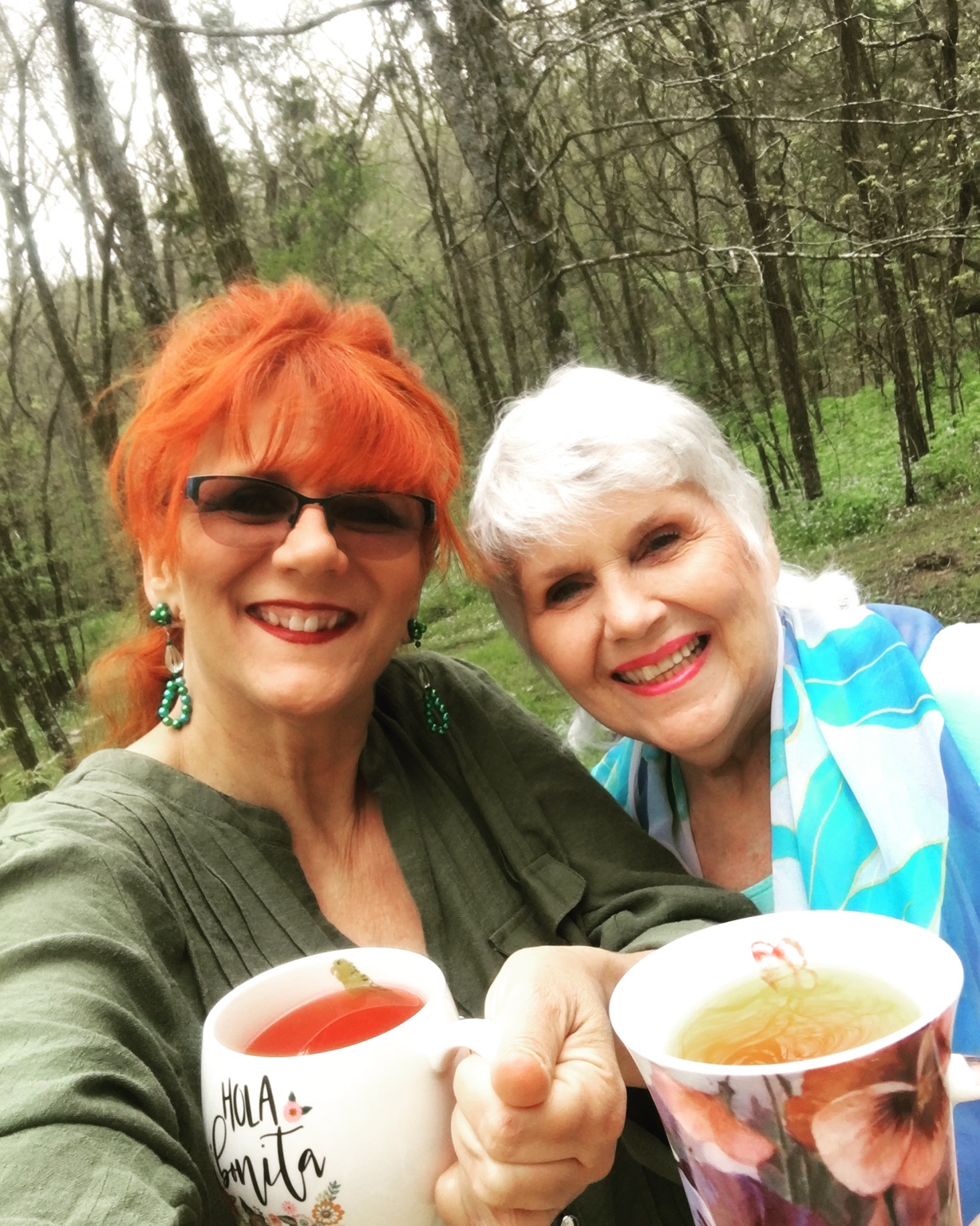 Keeli and her mom sharing a cup outdoors